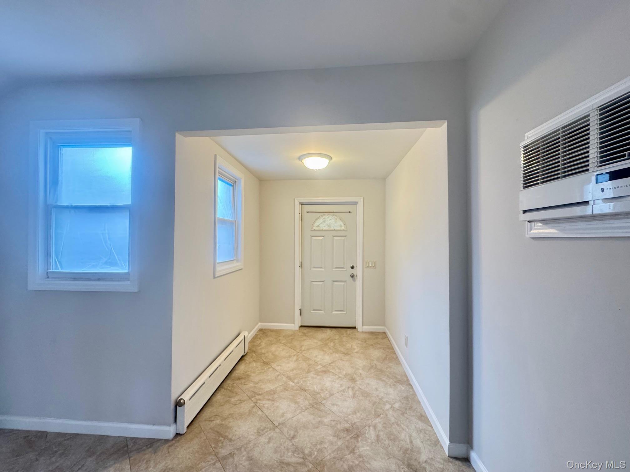 164-36 77th Road Queens, NY 11366 - Photo 5 of 20 a view of hallway with livingroom