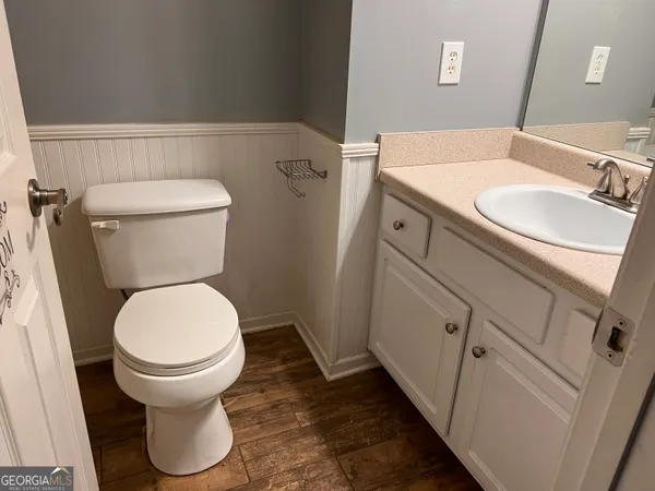 a bathroom with a sink and a toilet