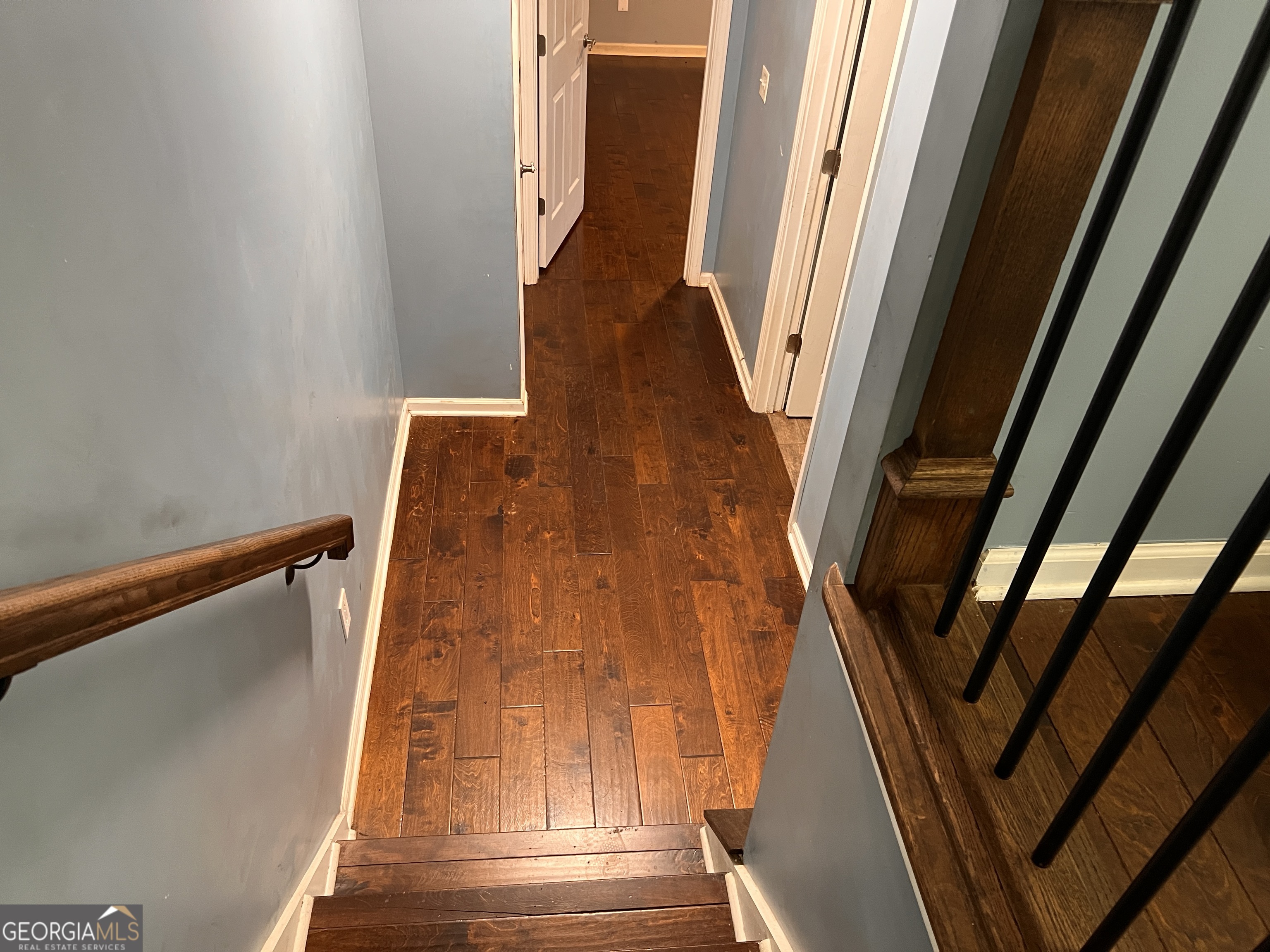 20 Triangle Lane Adairsville, GA 30103 - Photo 16 of 17 a view of staircase with wooden floor and a window