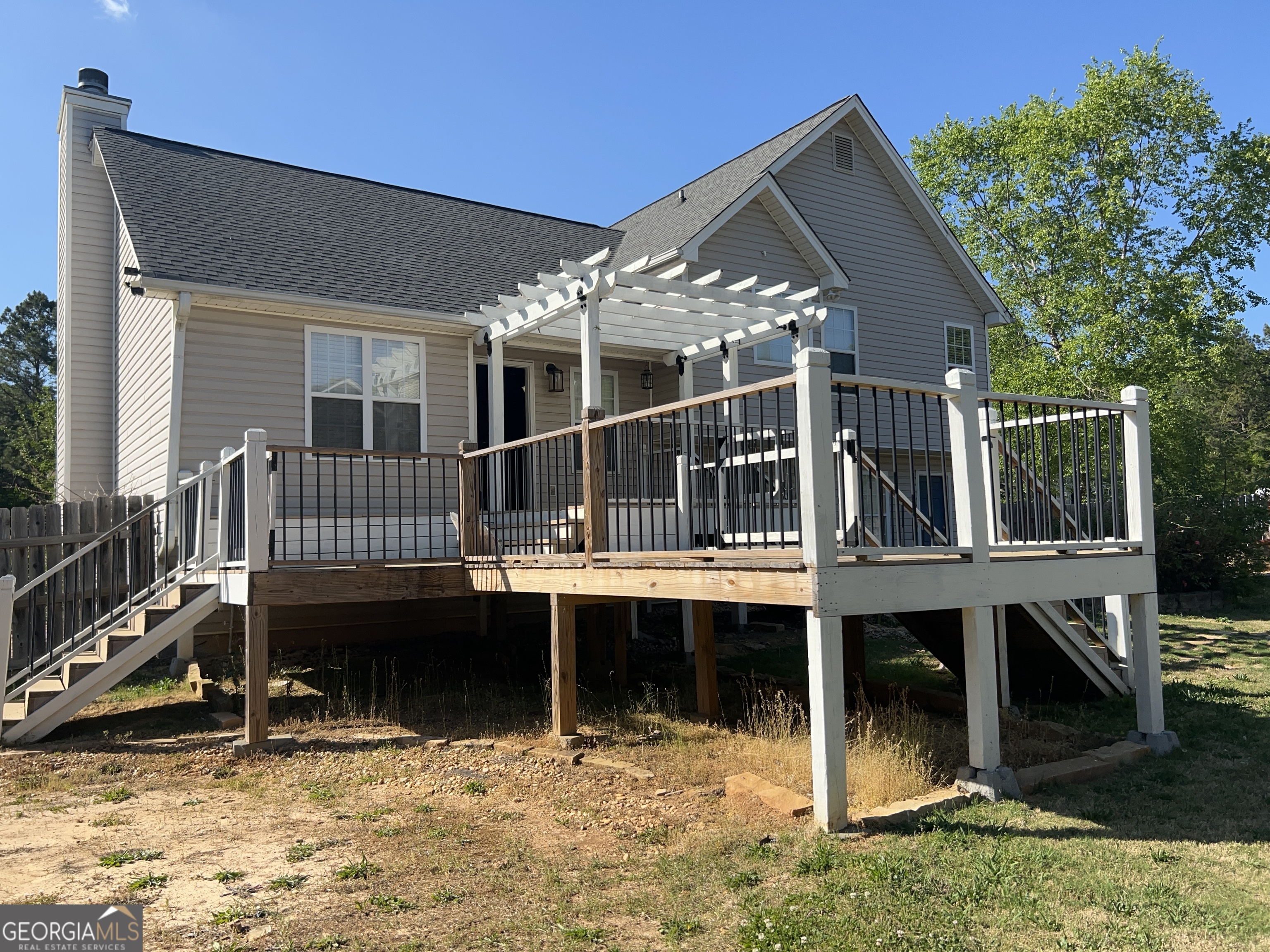 20 Triangle Lane Adairsville, GA 30103 - Photo 3 of 17 a view of house with swimming pool and sitting area