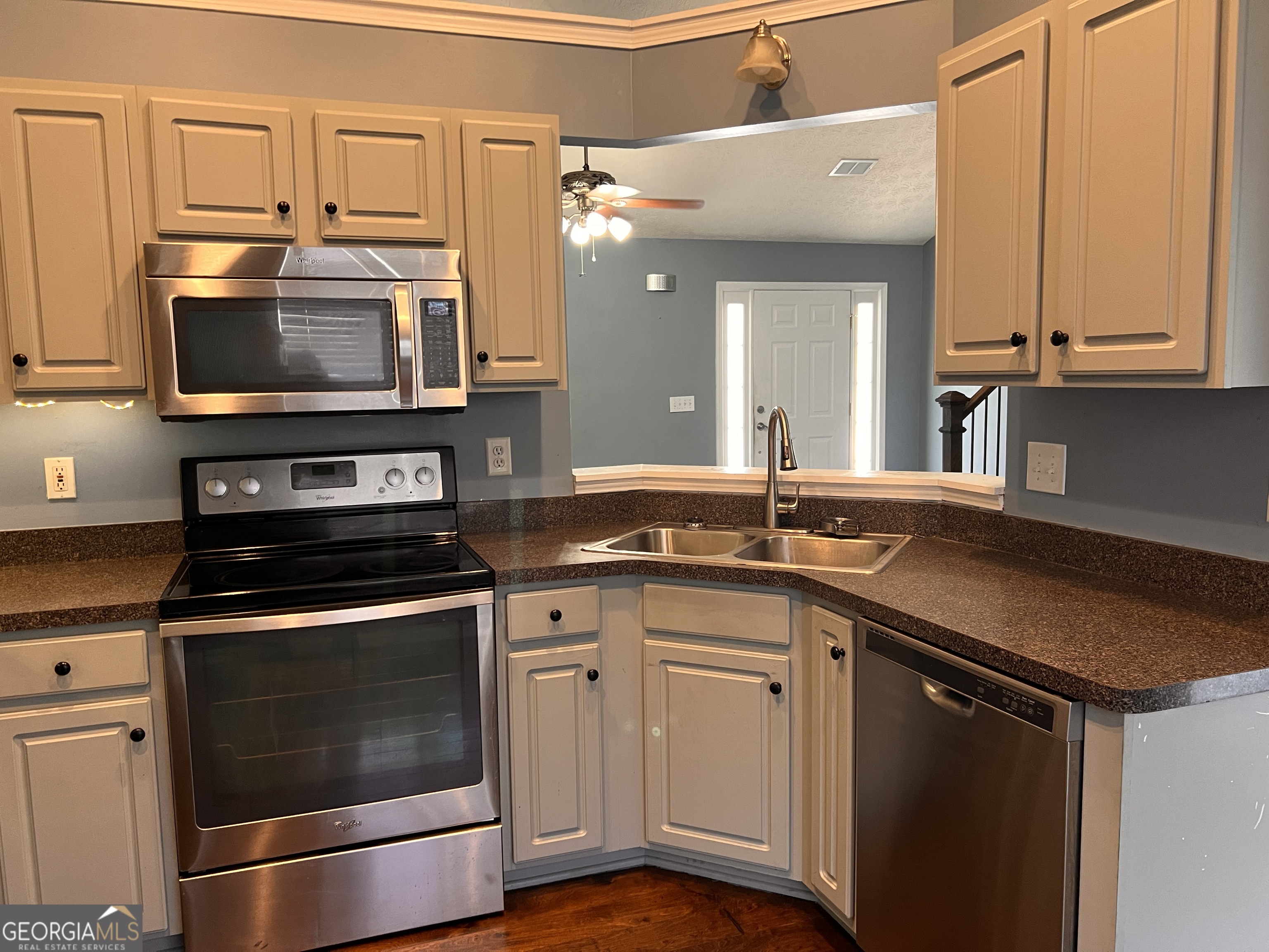 20 Triangle Lane Adairsville, GA 30103 - Photo 6 of 17 a kitchen with stainless steel appliances granite countertop a stove microwave and sink