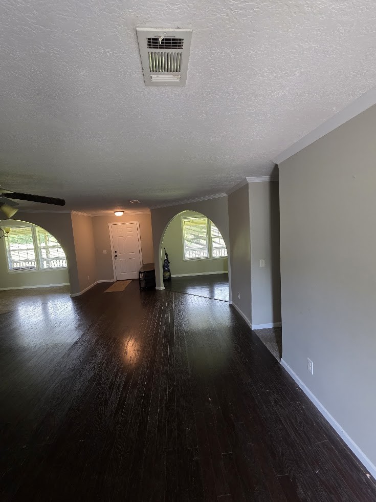 2004 Luther Sharp Road Columbia, TN 38401 - Photo 5 of 18 an empty room with wooden floor and windows