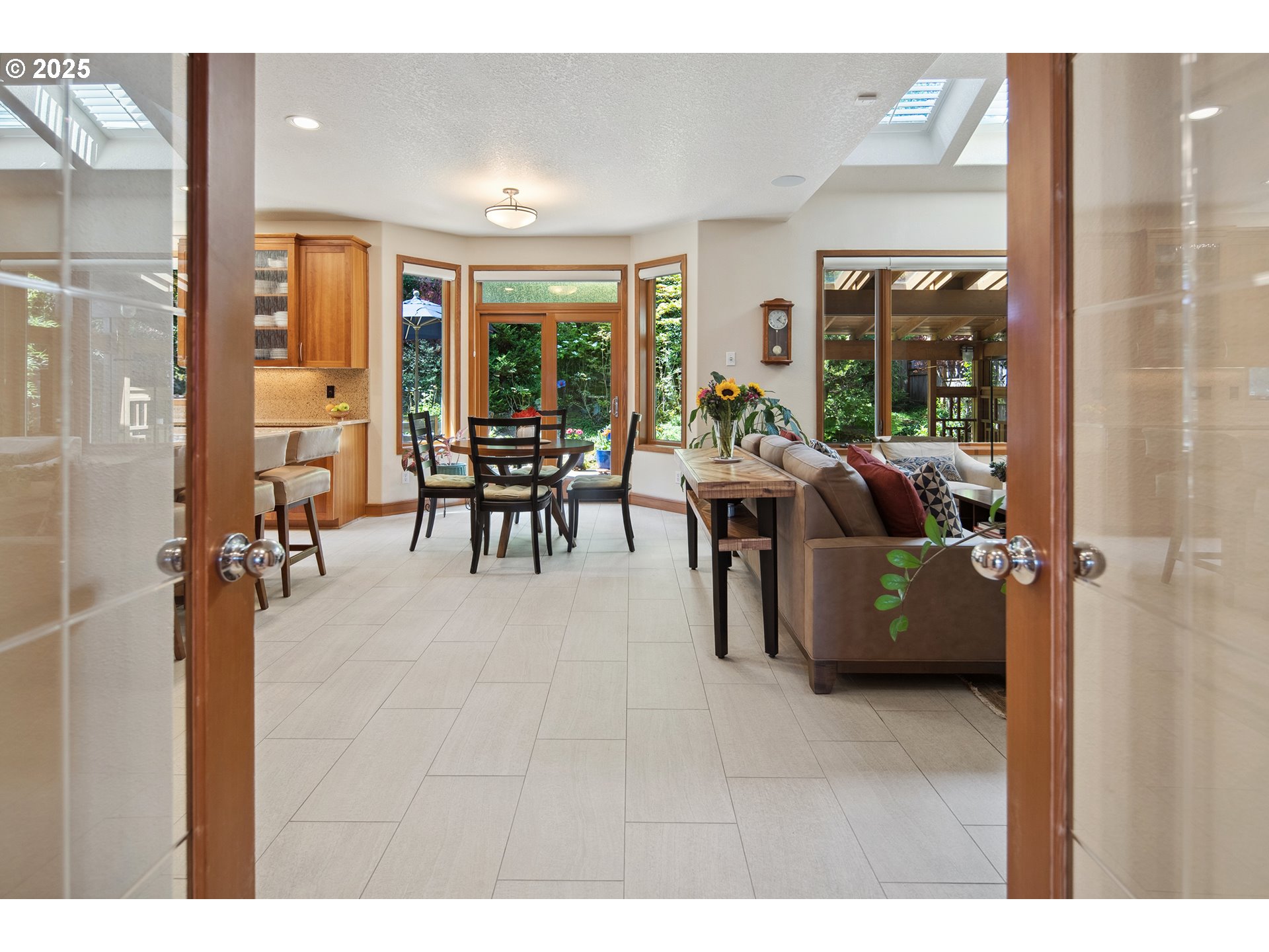 17514 Brookhurst Drive Lake Oswego, OR 97034 - Photo 17 of 37 a living room with furniture and large windows