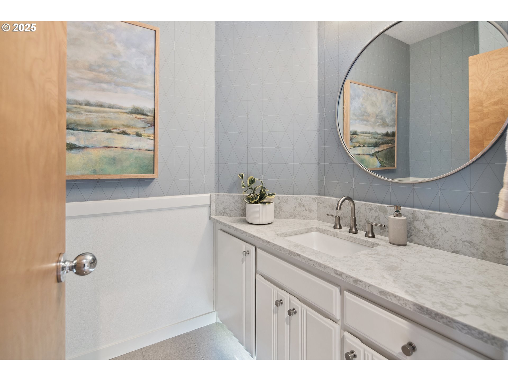 17514 Brookhurst Drive Lake Oswego, OR 97034 - Photo 19 of 37 a bathroom with a sink and mirror