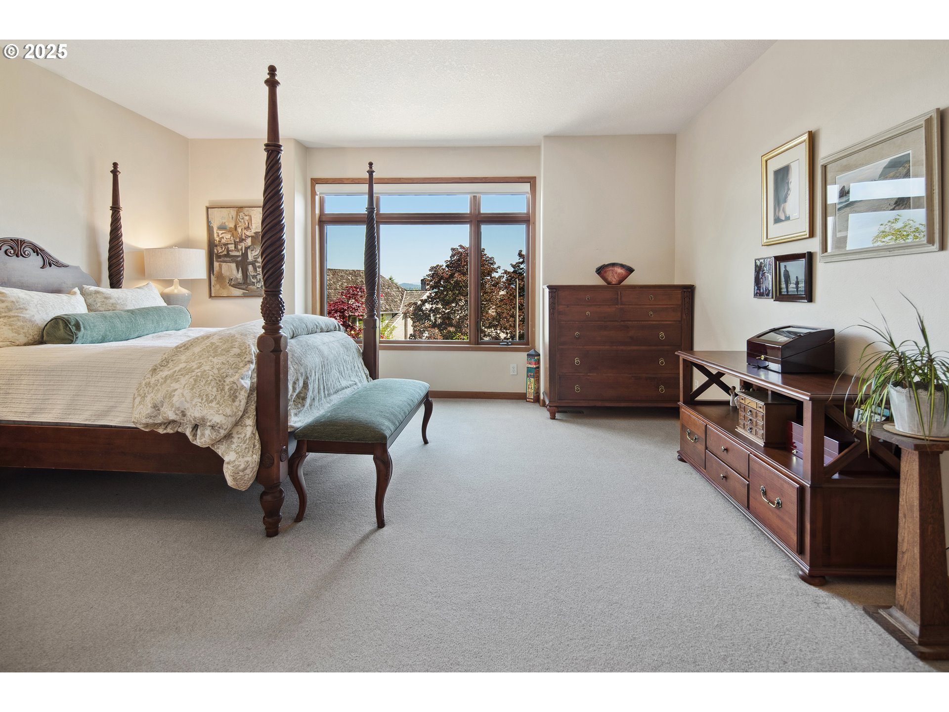 17514 Brookhurst Drive Lake Oswego, OR 97034 - Photo 23 of 37 a bedroom with furniture and a window