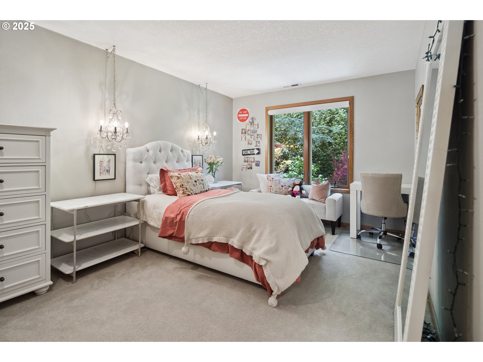 17514 Brookhurst Drive Lake Oswego, OR 97034 - Photo 29 of 37 a bed room with a bed and a chair