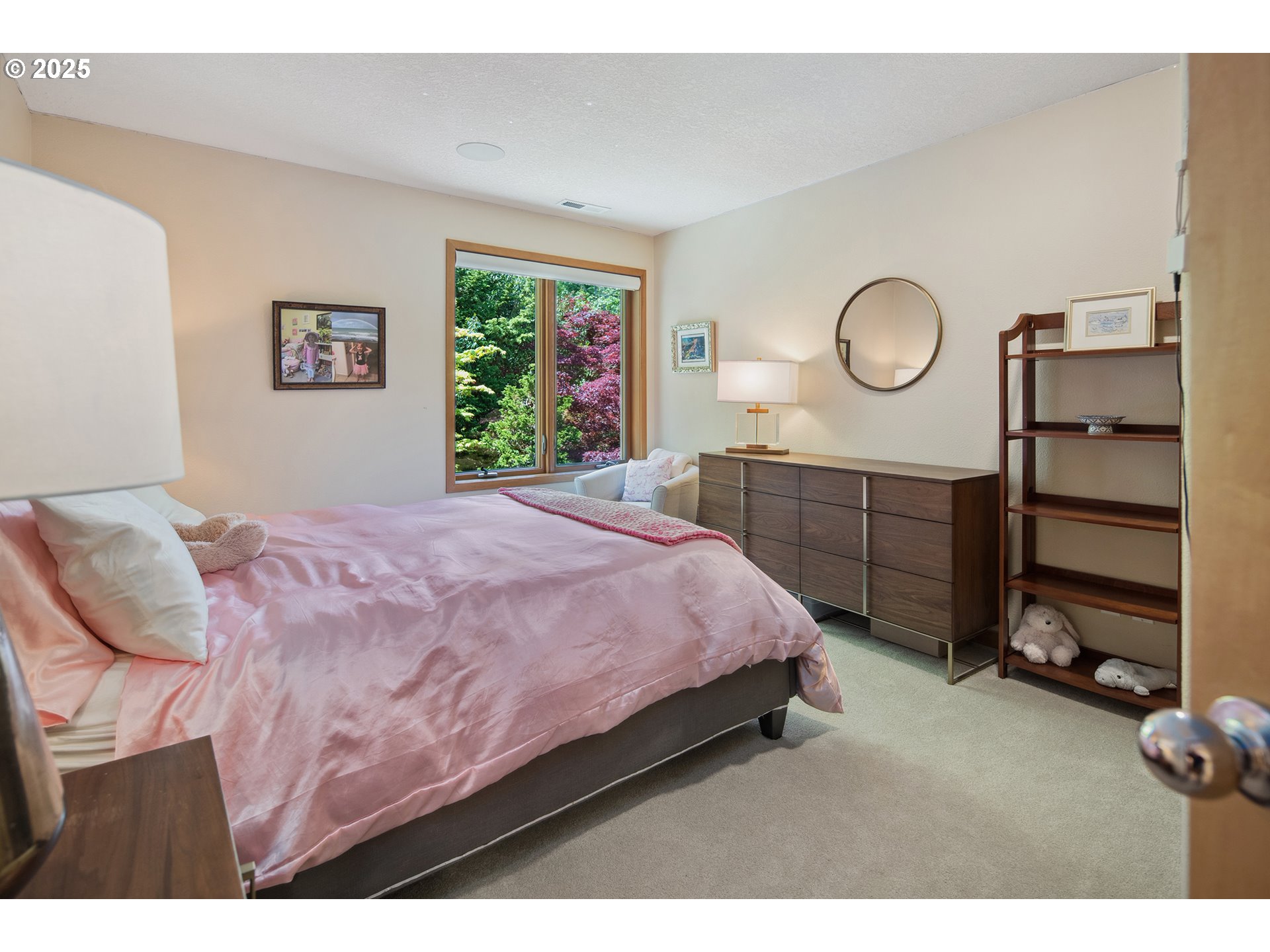 17514 Brookhurst Drive Lake Oswego, OR 97034 - Photo 30 of 37 a bed room with a bed and a window