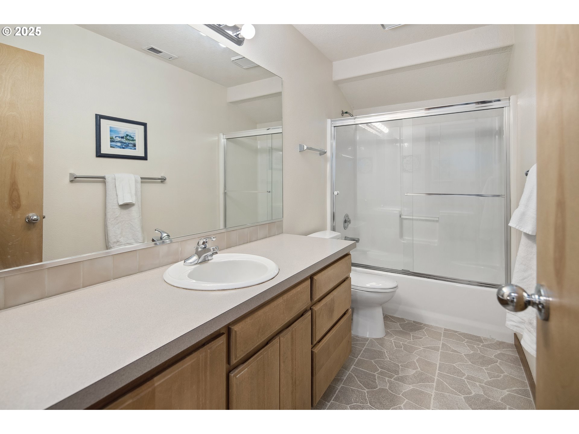 17514 Brookhurst Drive Lake Oswego, OR 97034 - Photo 31 of 37 a bathroom with a sink toilet double vanity and shower