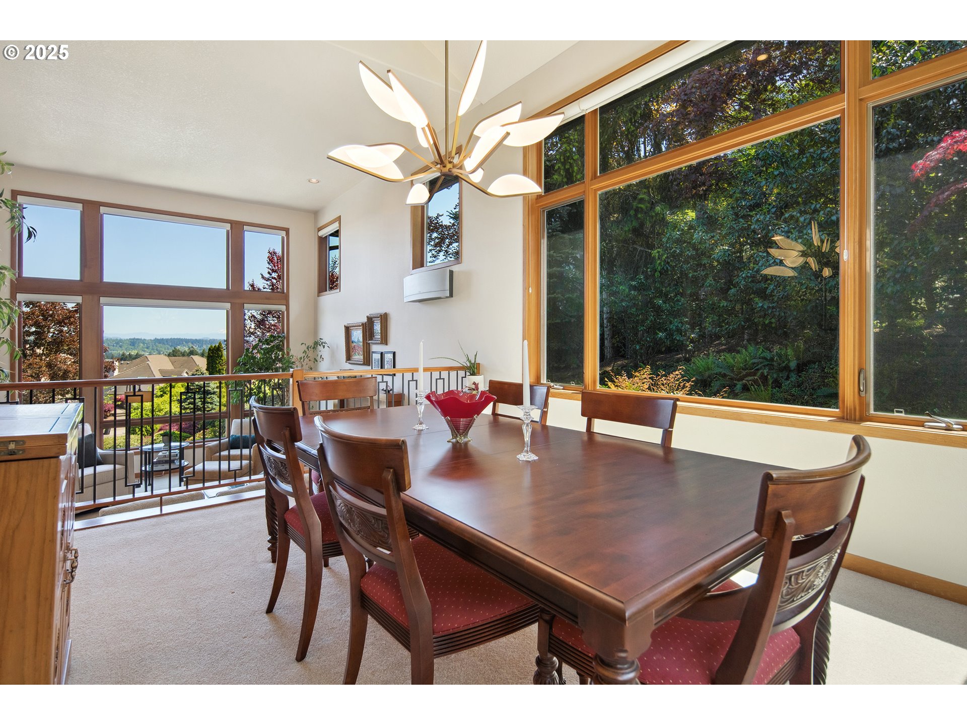 17514 Brookhurst Drive Lake Oswego, OR 97034 - Photo 5 of 37 a dining room with furniture a chandelier and wooden floor