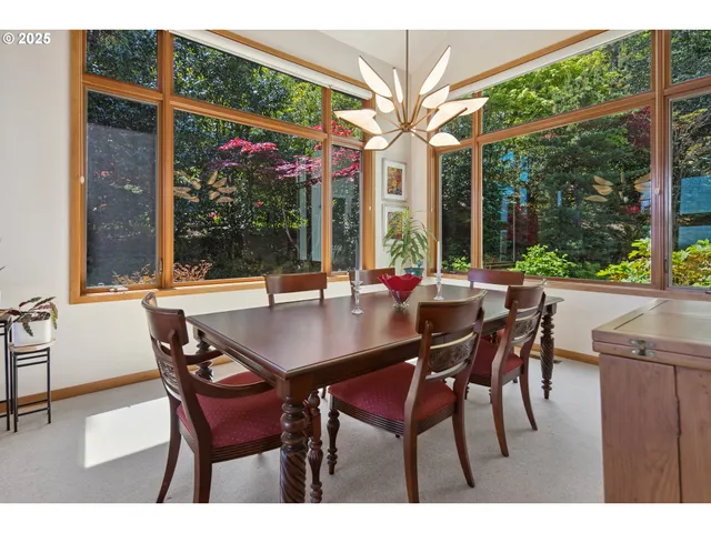 a outdoor dining space with furniture and garden view