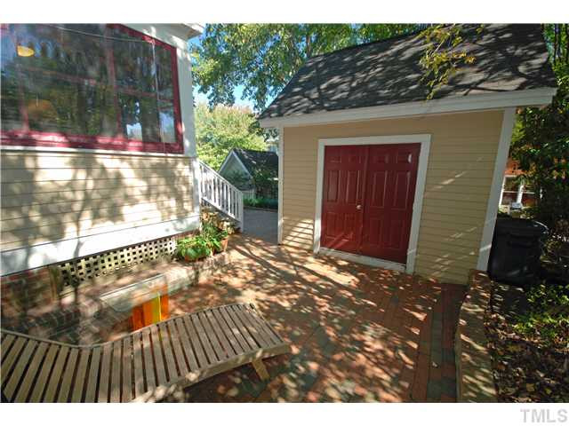 600 Latham Way Raleigh, NC 27604 - Photo 23 of 25 Seller used to use this area as his personal escape by opening the shed doors and hanging his wide screen inside. Back Yard