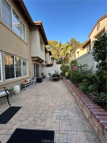 a view of a building with sitting area