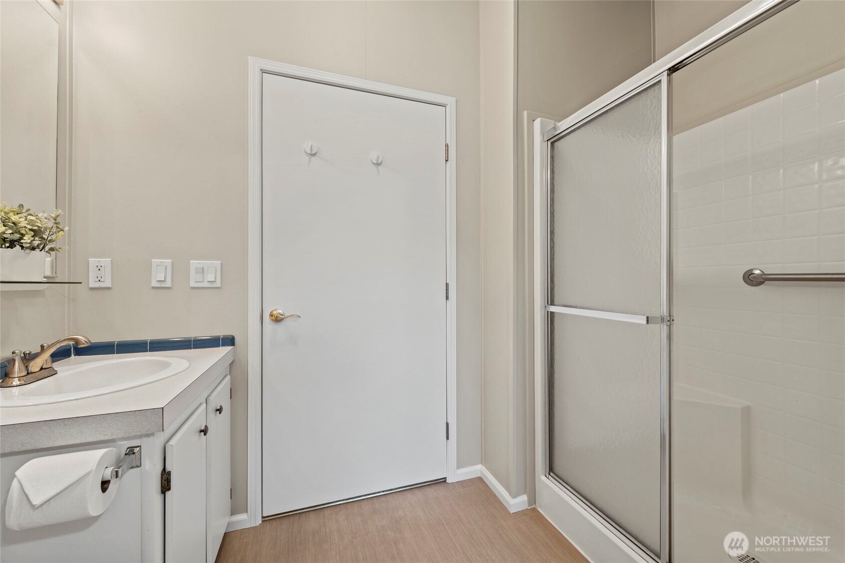 23825 15th Avenue Southeast, Unit 108 Bothell, WA 98021 - Photo 14 of 39 a view of a bathroom from the hallway