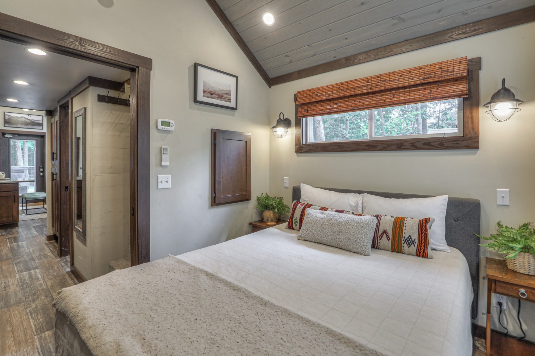 574 Deer Lick Trail Monteagle, TN 37356 - Photo 12 of 21 a bedroom with a large bed and a window