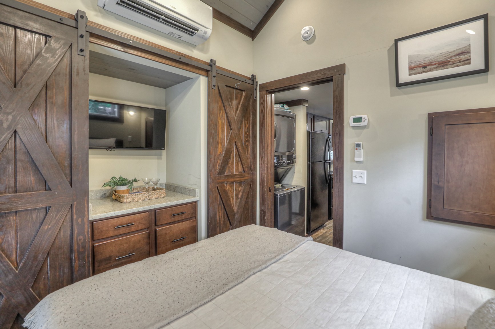 574 Deer Lick Trail Monteagle, TN 37356 - Photo 13 of 21 a bedroom with a bed and a view of bathroom