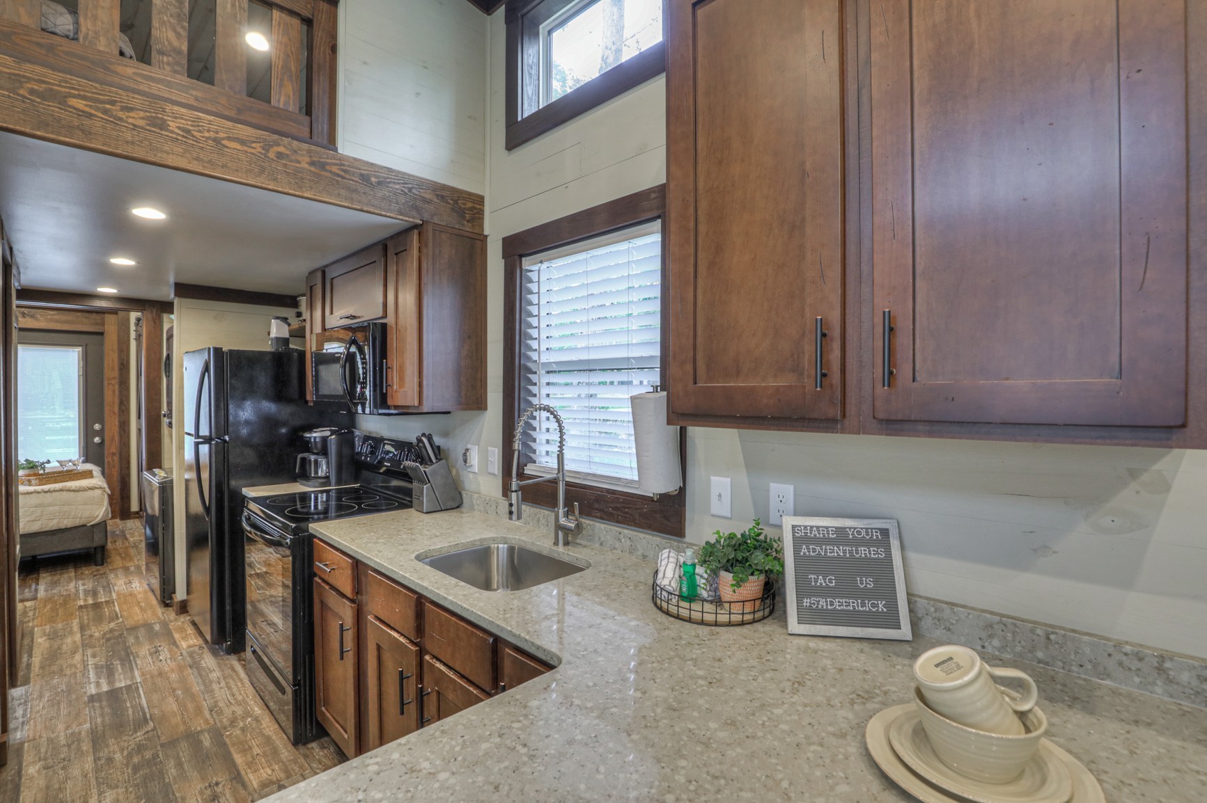 574 Deer Lick Trail Monteagle, TN 37356 - Photo 6 of 21 a kitchen with a sink and a stove top oven