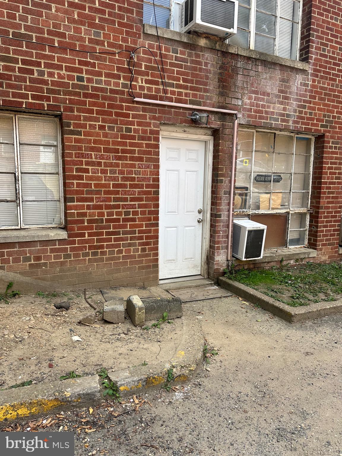 2400 Good Hope Road Southeast, Unit 3 Washington, DC 20020 - Photo 2 of 2 a view of a brick house with a yard