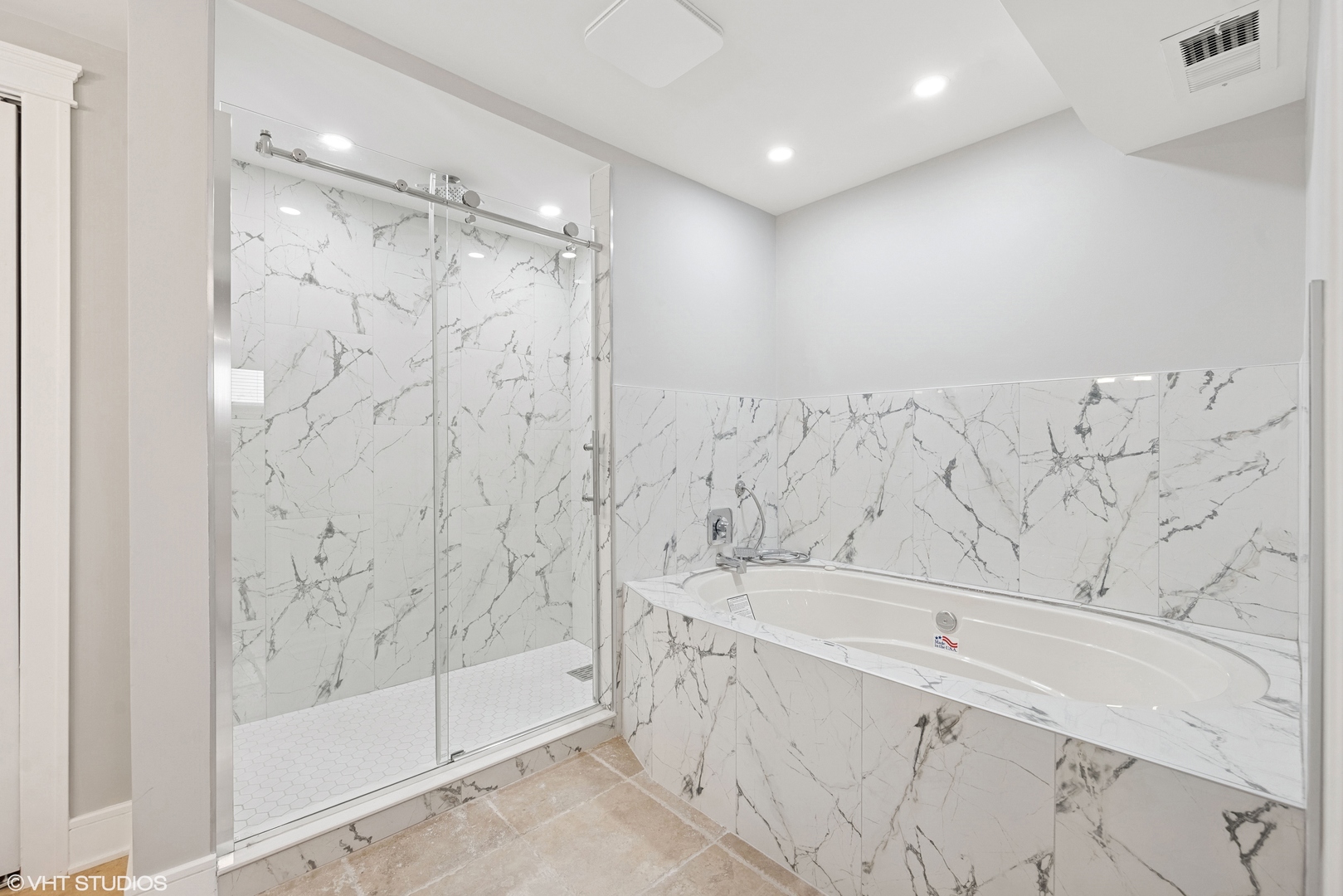 932 60th Place Downers Grove, IL 60516 - Photo 19 of 25 a bathroom with a bathtub and a shower