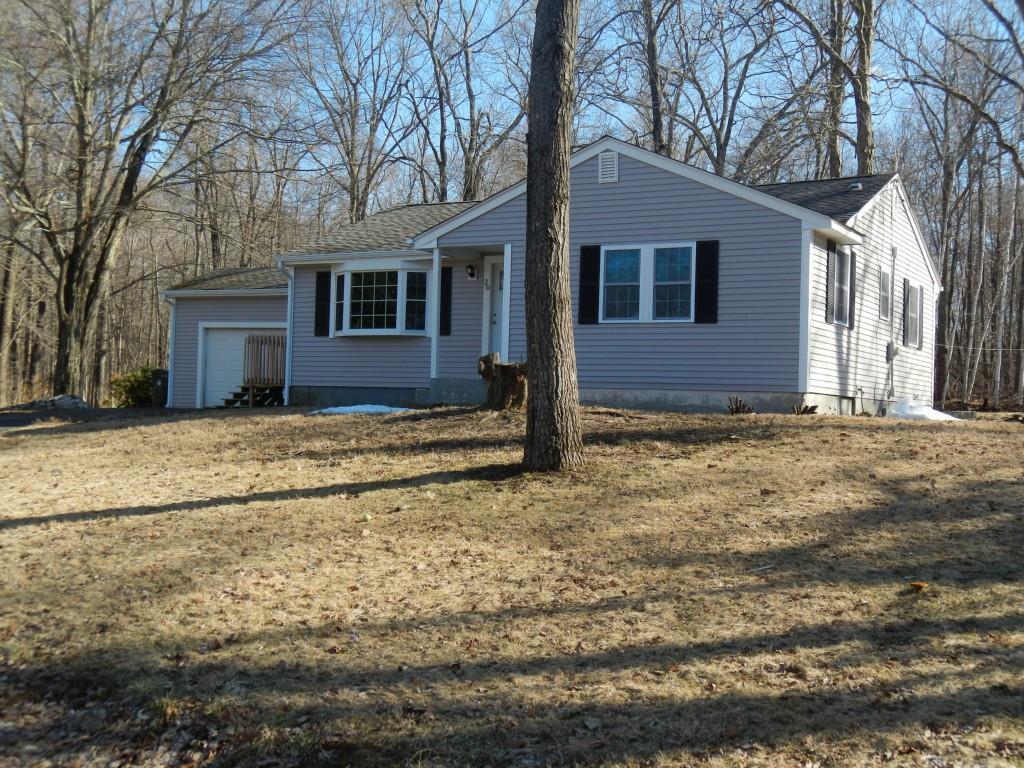 Totally renovated home in desirable location with the Tolland Forest in your own backyard.