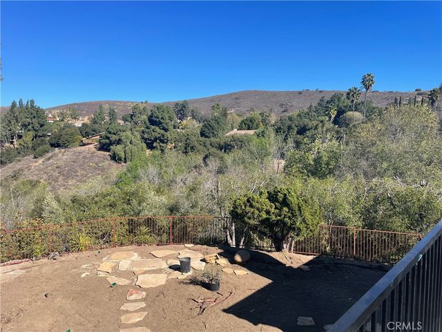 a view of a city from a balcony