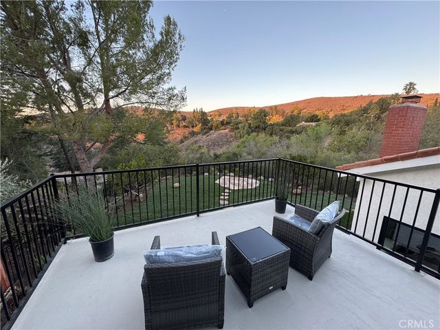 a view of a deck with a patio