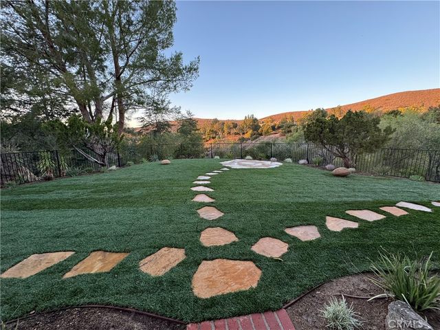 a view of a garden with an outdoor space