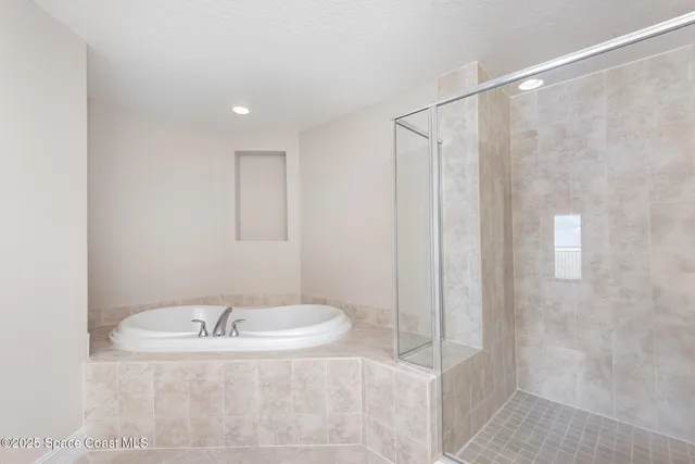 a bathroom with a sink and a shower