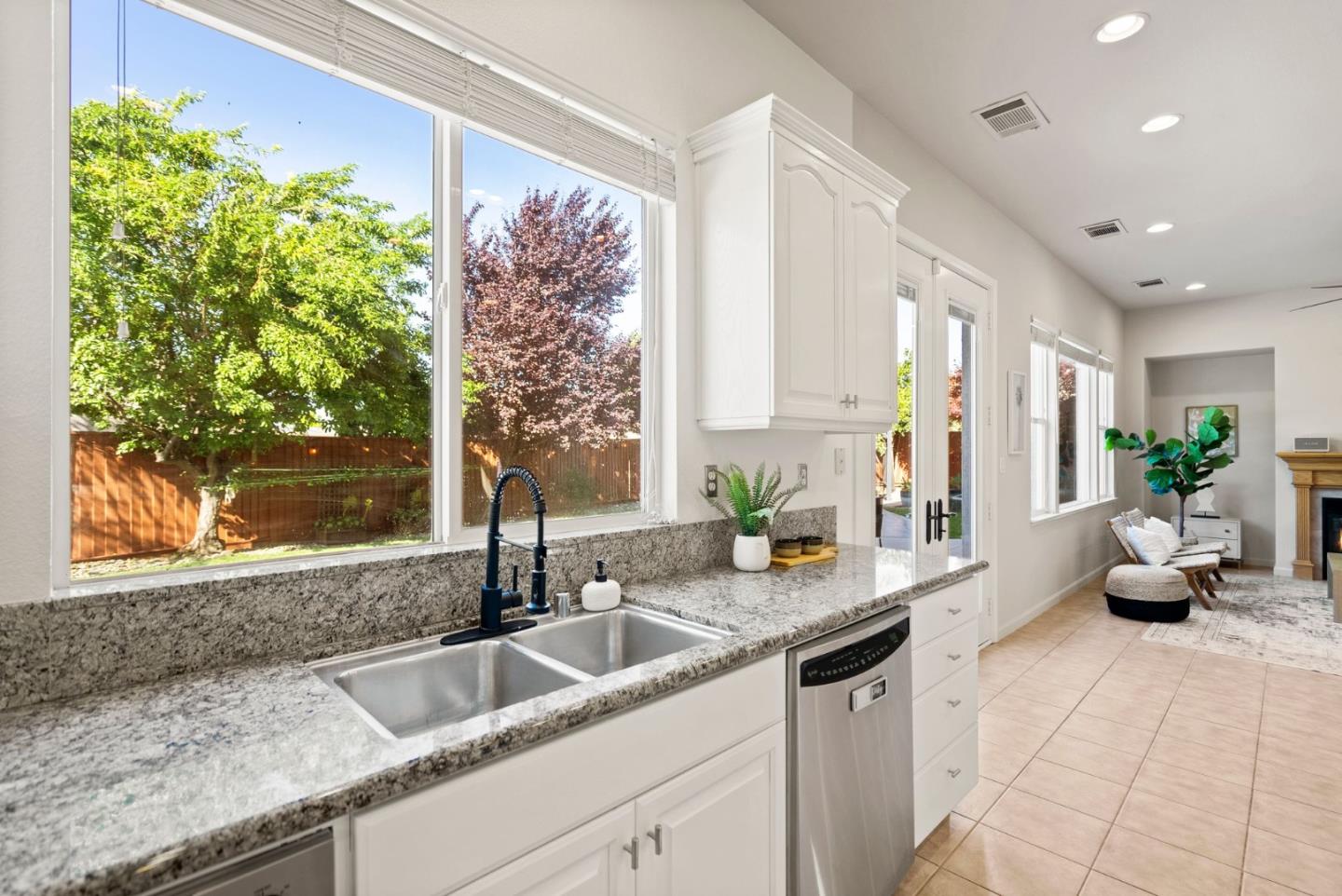 4863 Greencastle Way Antioch, CA 94531 - Photo 12 of 52 a kitchen with a sink and a potted plant
