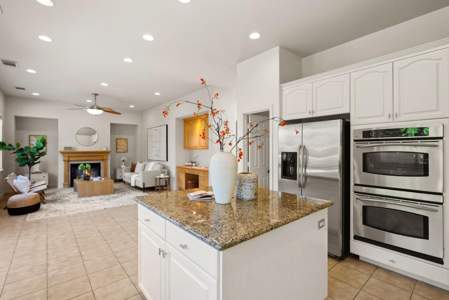 4863 Greencastle Way Antioch, CA 94531 - Photo 13 of 52 a kitchen with stainless steel appliances granite countertop a sink refrigerator and cabinets