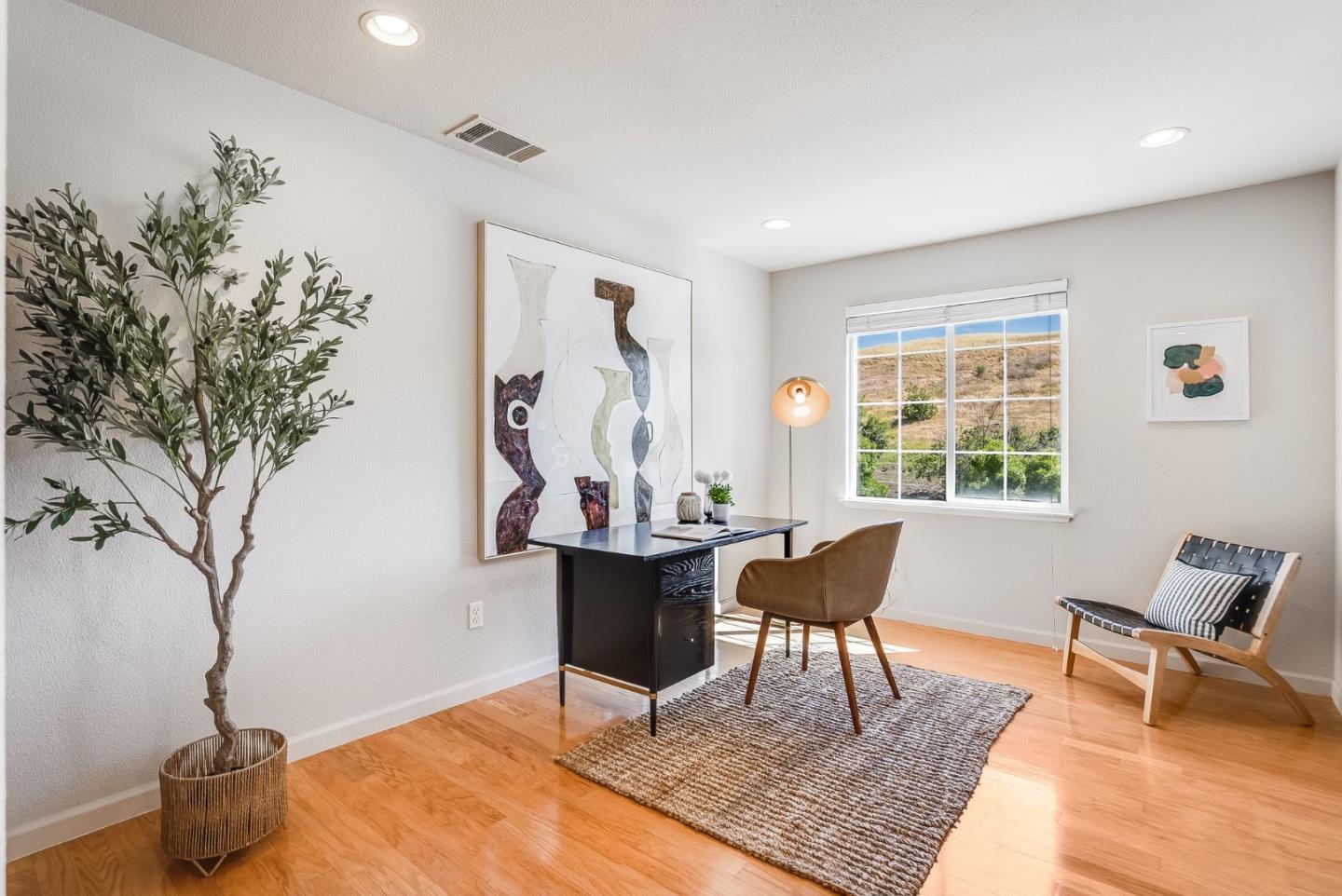 4863 Greencastle Way Antioch, CA 94531 - Photo 21 of 52 a living room with furniture and a potted plant