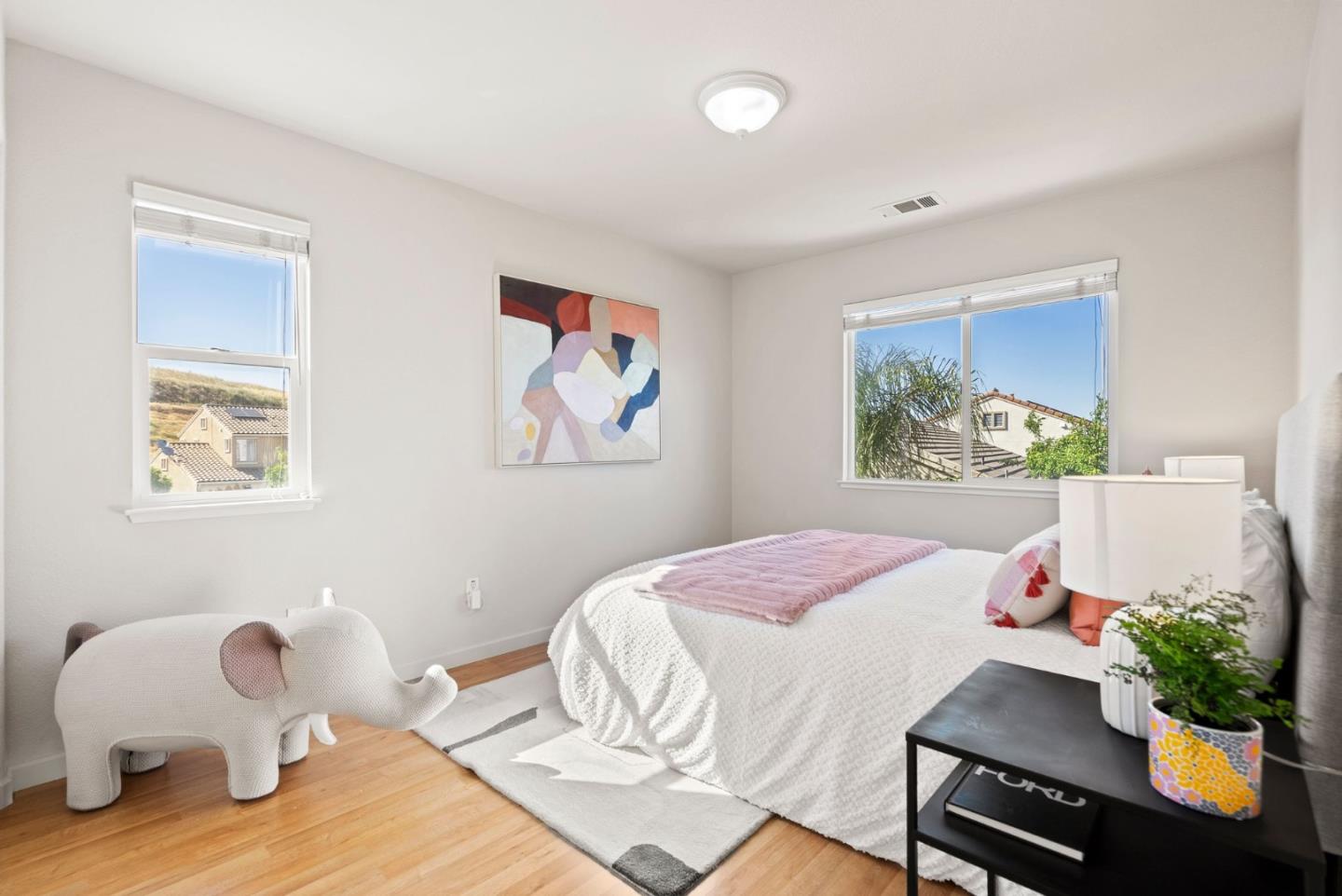 4863 Greencastle Way Antioch, CA 94531 - Photo 23 of 52 a bedroom with a bed and wooden floor