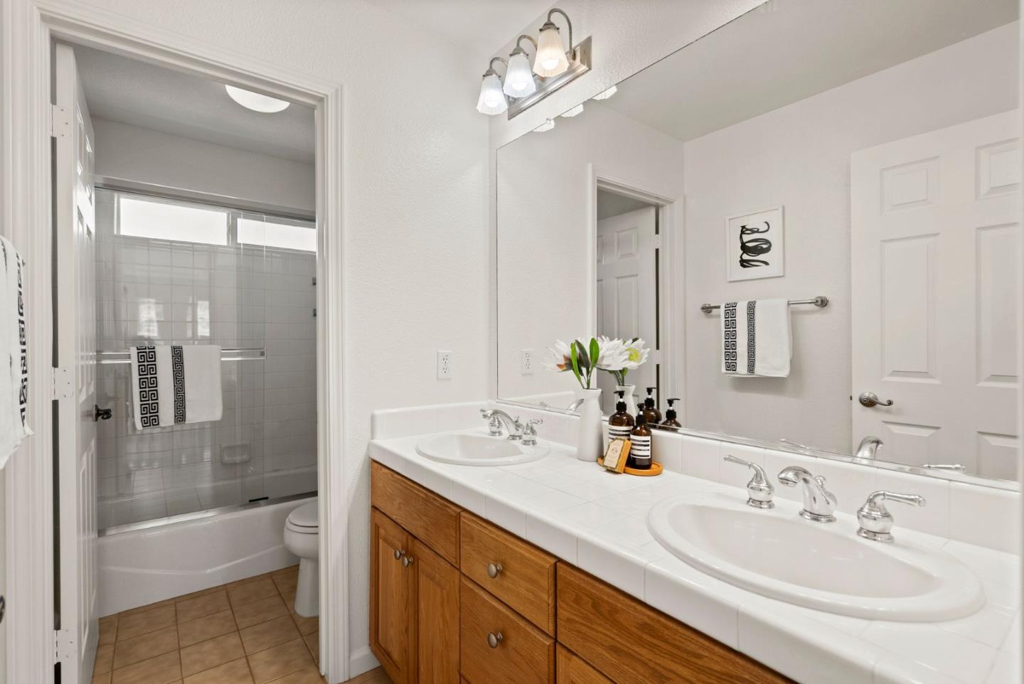 4863 Greencastle Way Antioch, CA 94531 - Photo 25 of 52 a bathroom with a sink a toilet and shower