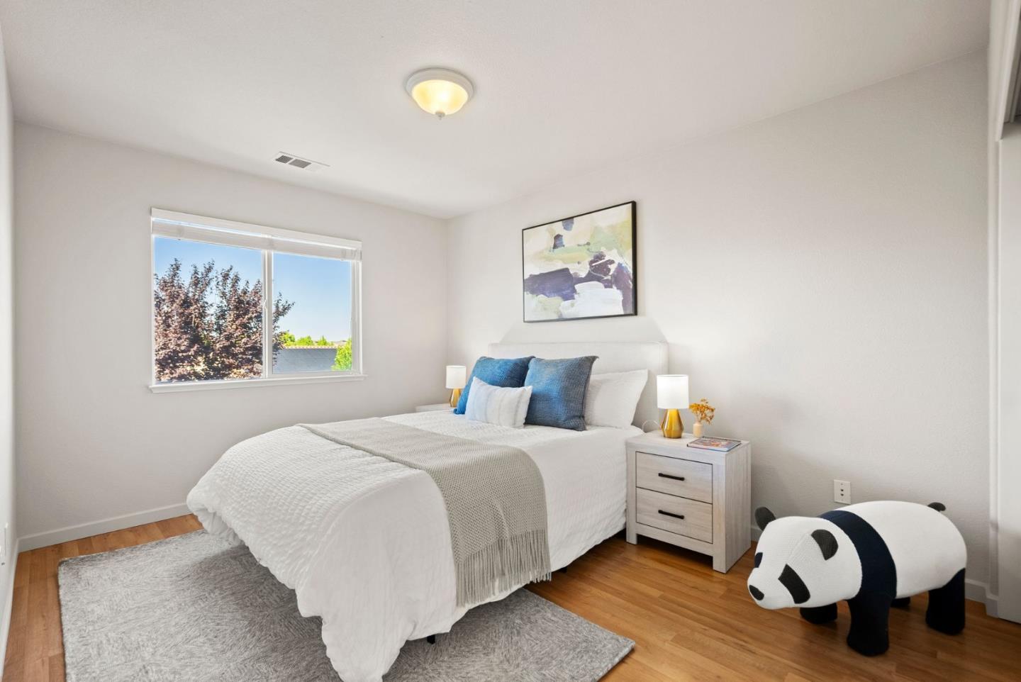 4863 Greencastle Way Antioch, CA 94531 - Photo 26 of 52 a bedroom with a bed and a painting on the wall