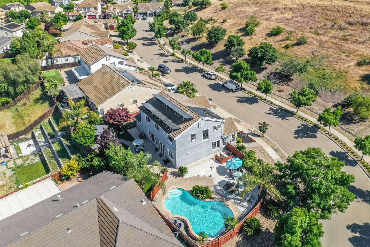 4863 Greencastle Way Antioch, CA 94531 - Photo 49 of 52 an aerial view of a house with a yard and garden