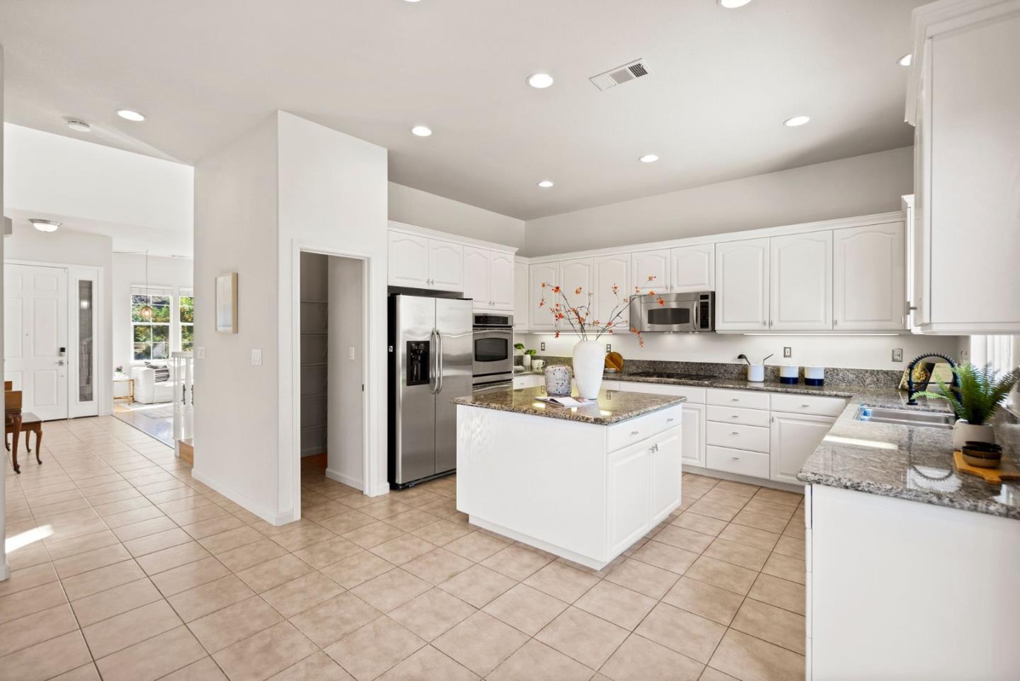 4863 Greencastle Way Antioch, CA 94531 - Photo 10 of 52 a kitchen with refrigerator and cabinets
