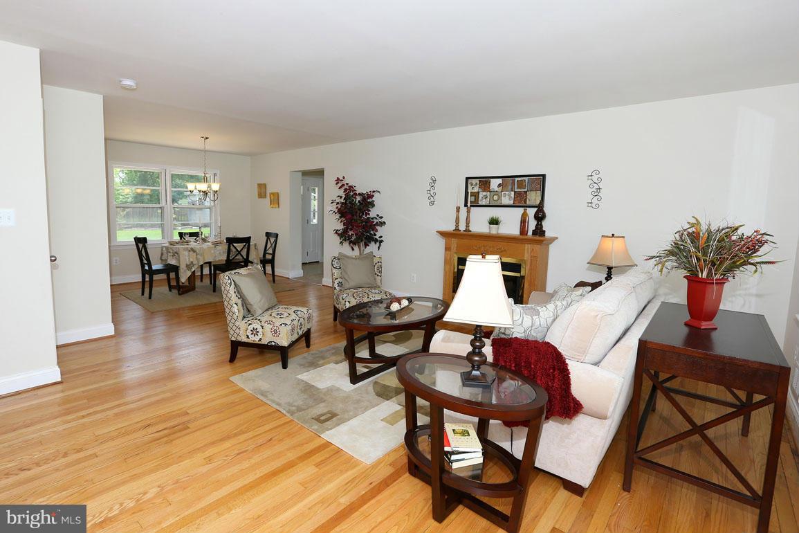 911 Ednor Road Silver Spring, MD 20905 - Photo 7 of 30 Refinished hardwood floors