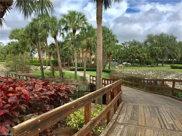 a view of backyard of house with seating space