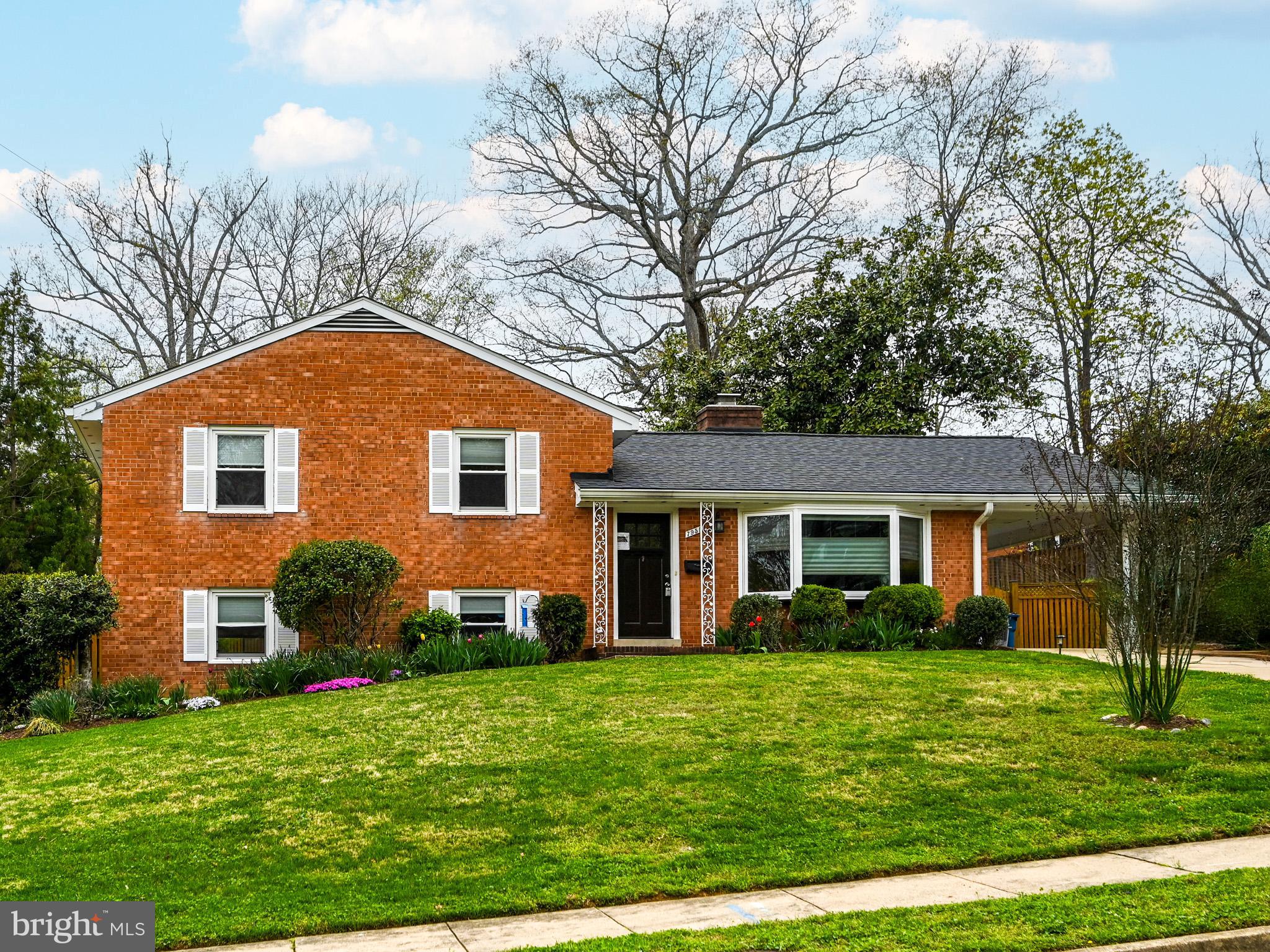 7951 Jansen Drive Springfield, VA 22152 - Photo 1 of 36 a front view of house with yard and green space