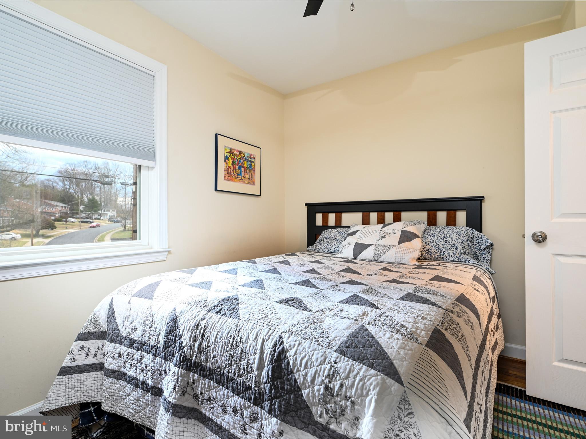 7951 Jansen Drive Springfield, VA 22152 - Photo 17 of 36 a bedroom with a bed and window