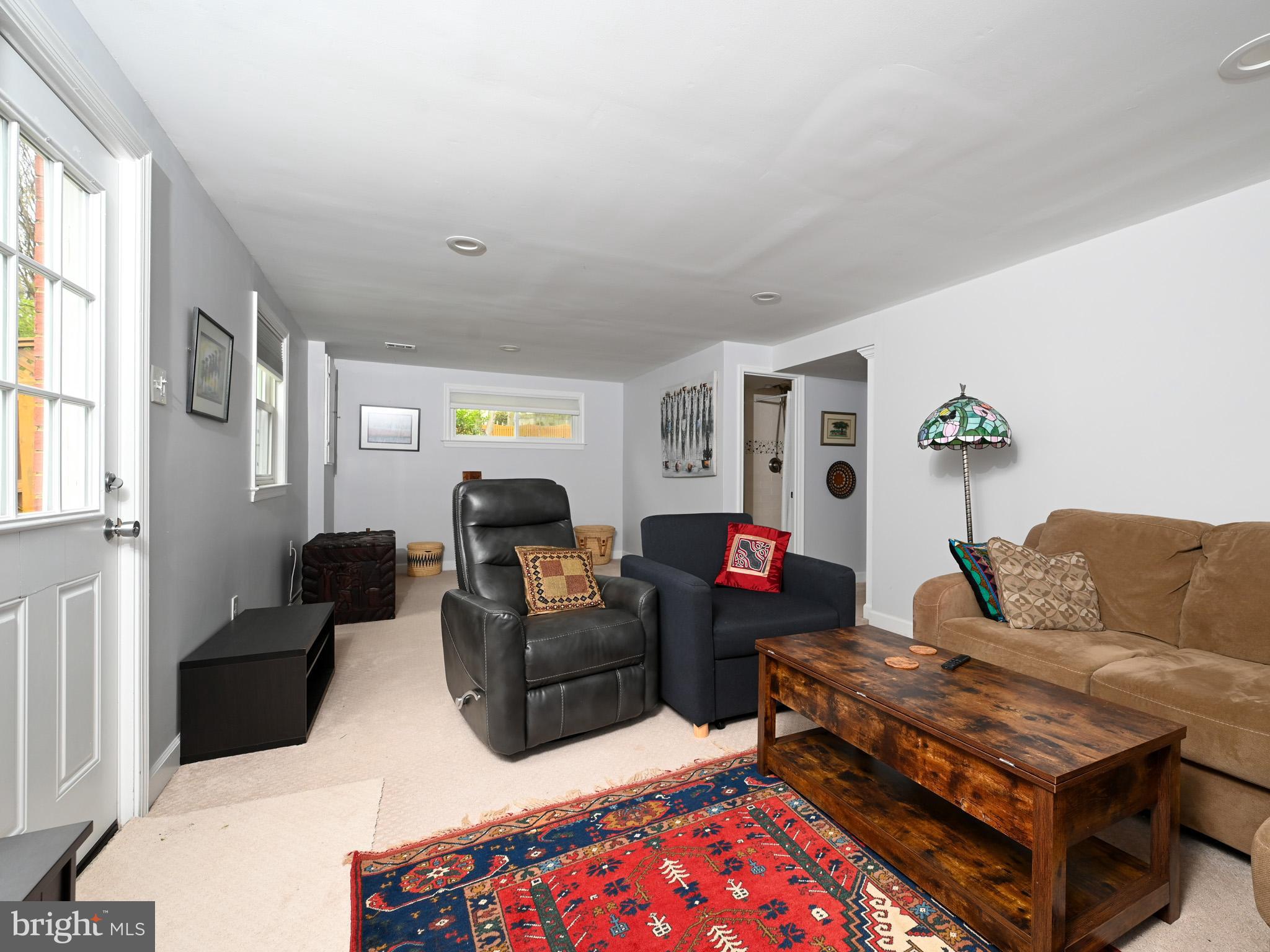 7951 Jansen Drive Springfield, VA 22152 - Photo 23 of 36 a living room with furniture and a flat screen tv