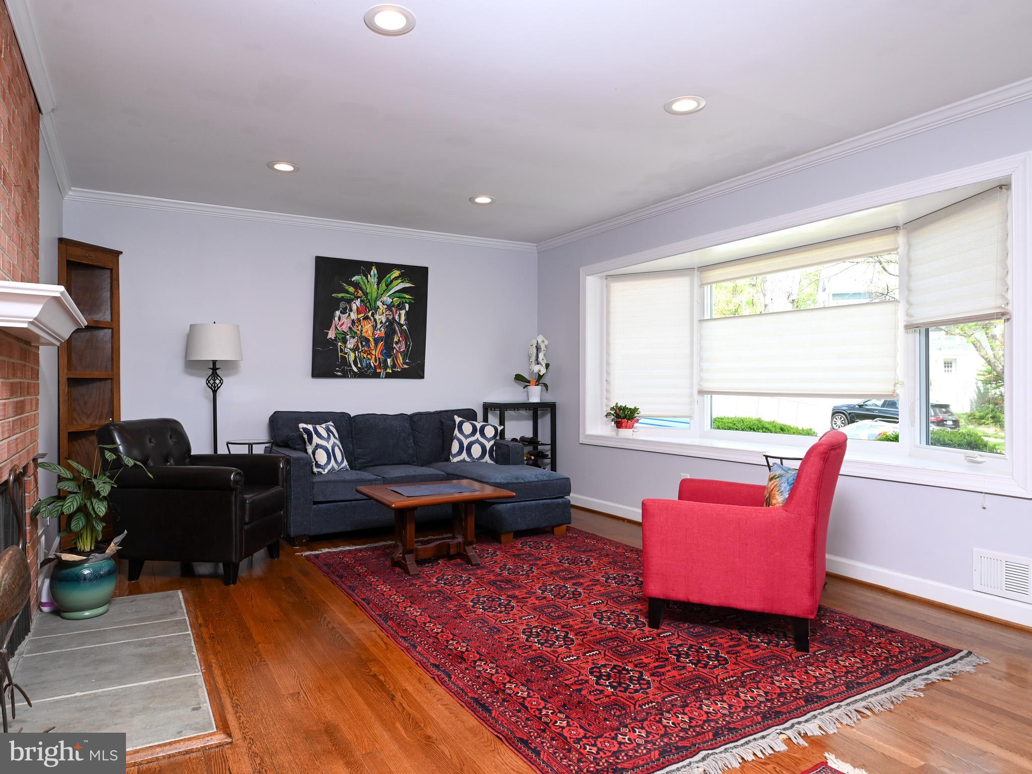 7951 Jansen Drive Springfield, VA 22152 - Photo 5 of 36 a living room with furniture rug and a large window