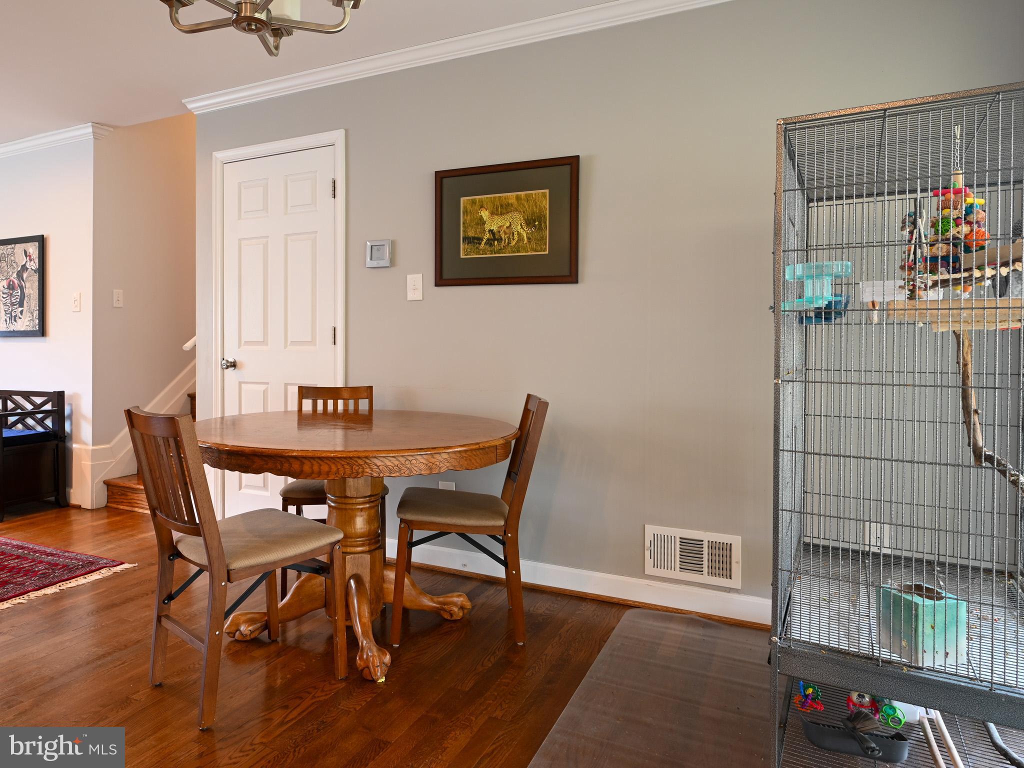 7951 Jansen Drive Springfield, VA 22152 - Photo 8 of 36 a dining room with furniture and wooden floor