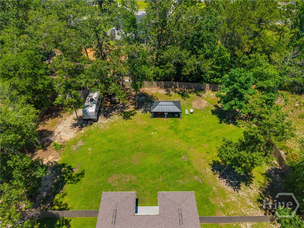 132 Ramsey Way Rincon, GA 31326 - Photo 55 of 59 The kind of backyard buyers don’t find often in a gated community.