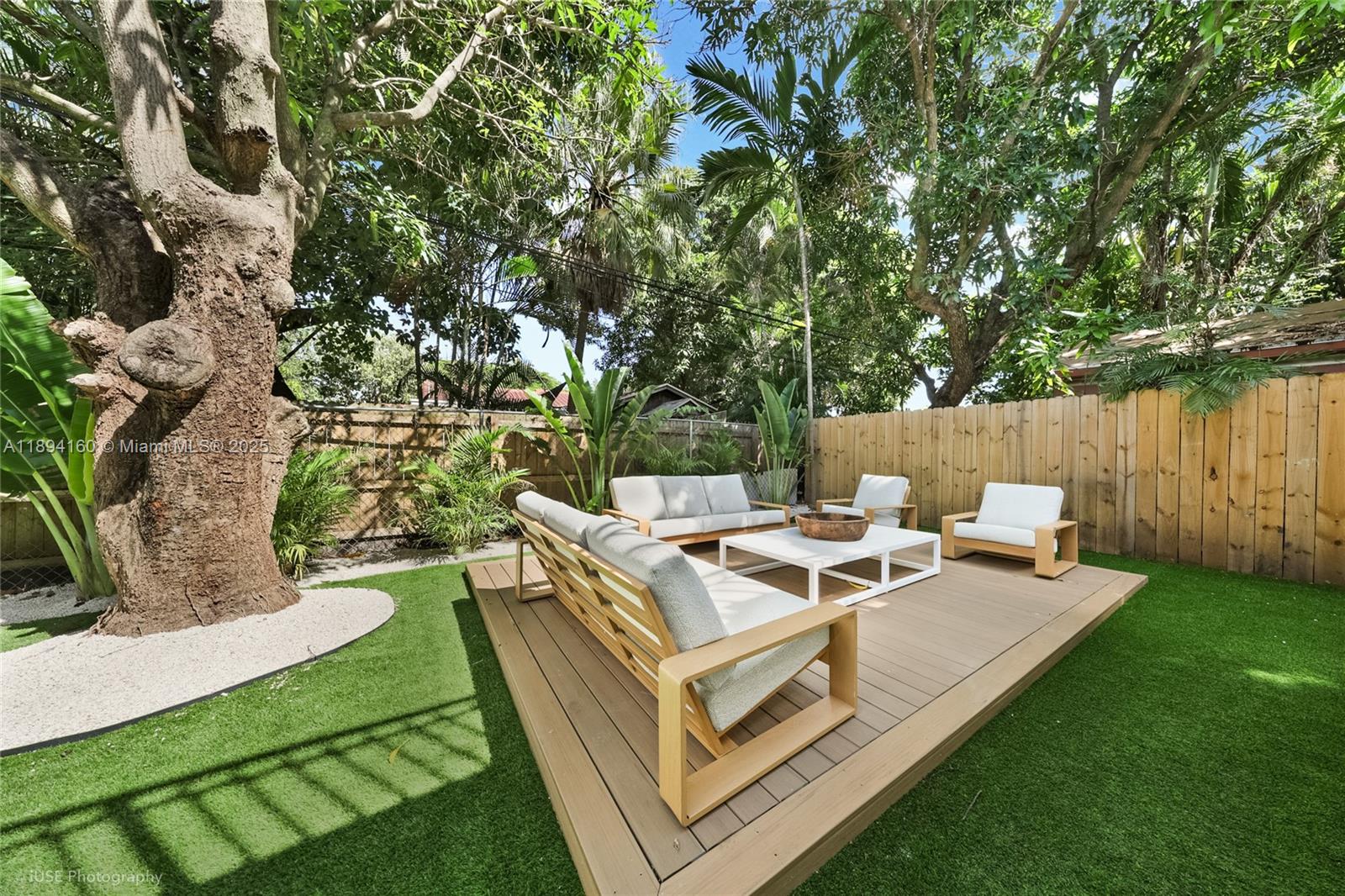 871 Northeast 81st Street Miami, FL 33138 - Photo 33 of 42 a view of a house with backyard porch and patio