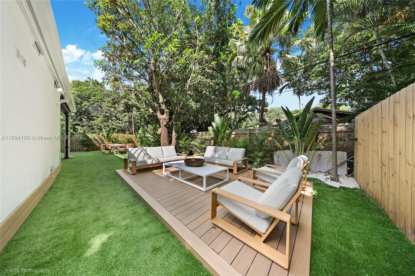 871 Northeast 81st Street Miami, FL 33138 - Photo 34 of 42 a view of a backyard with sitting area