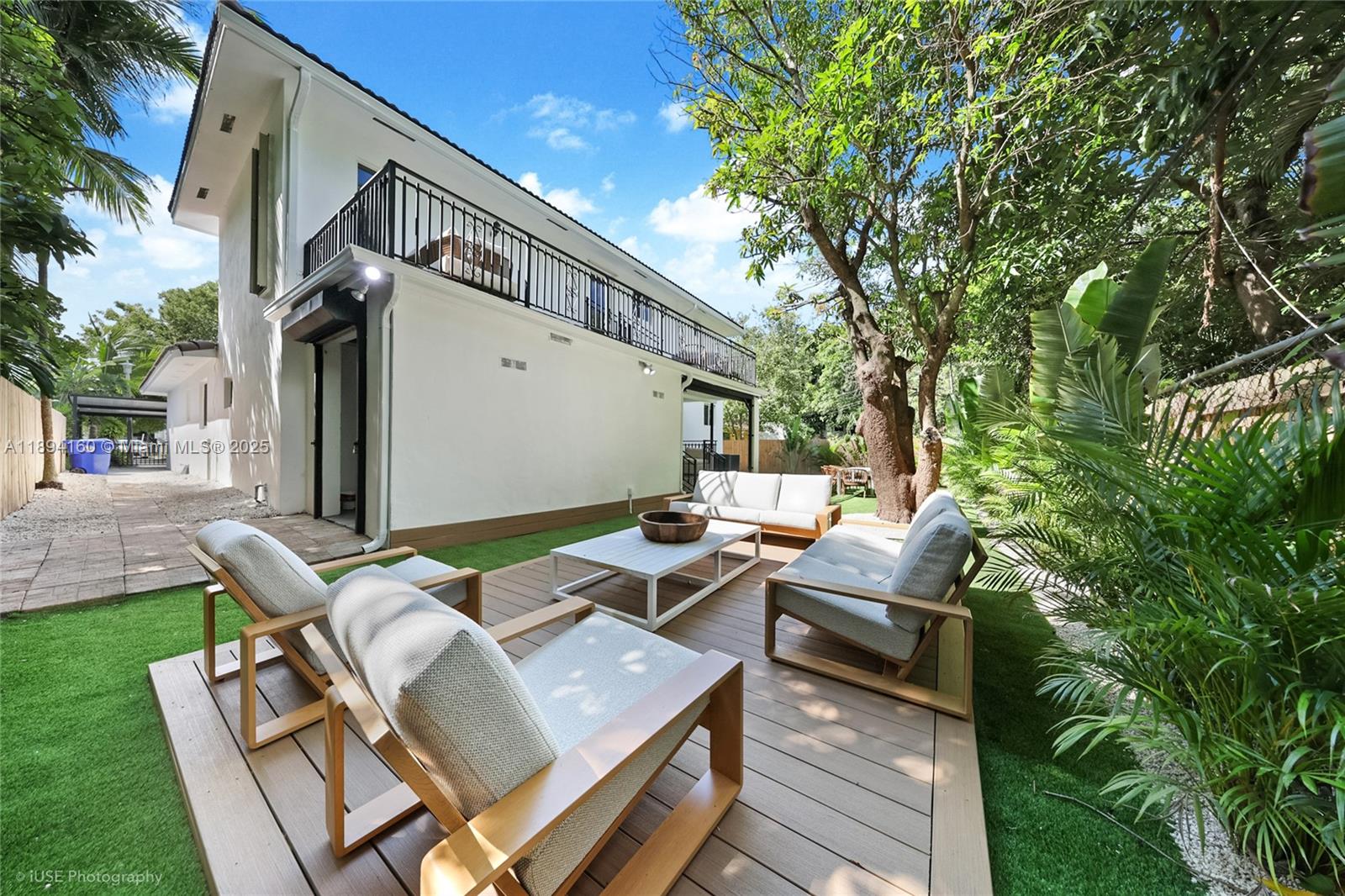 871 Northeast 81st Street Miami, FL 33138 - Photo 35 of 42 a view of backyard of house with seating space