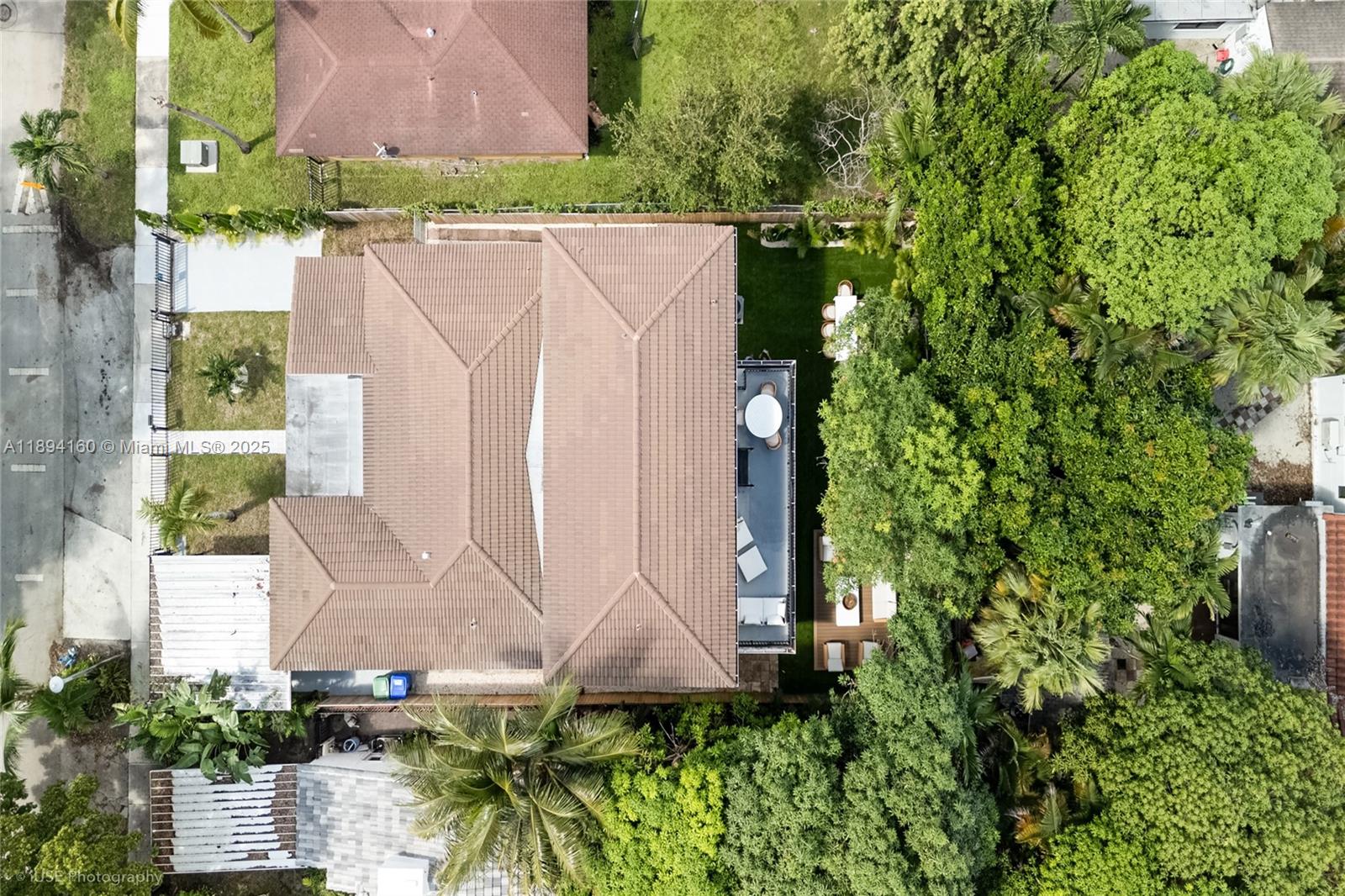 871 Northeast 81st Street Miami, FL 33138 - Photo 36 of 42 a aerial view of a house with a yard and plants