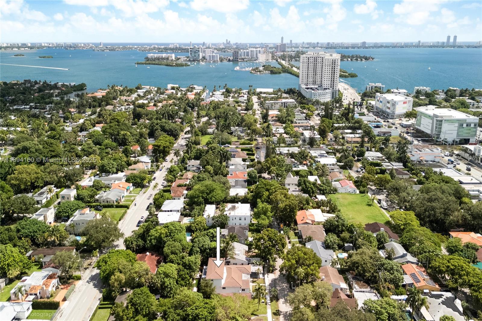 871 Northeast 81st Street Miami, FL 33138 - Photo 39 of 42 a view of a lake with a city