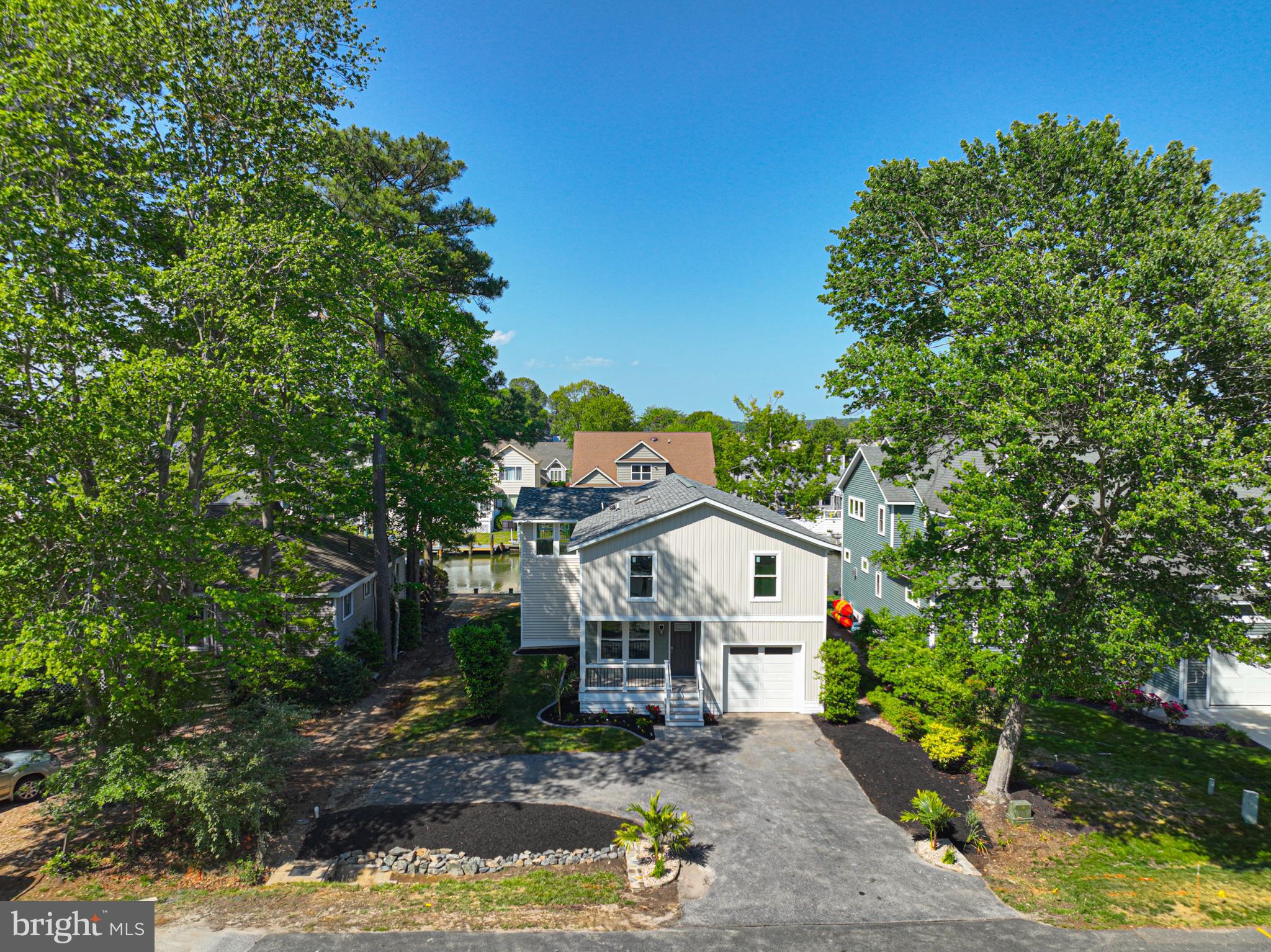 8 Grand Port Road Ocean Pines, MD 21811 - Photo 6 of 18 a front view of a house with garden