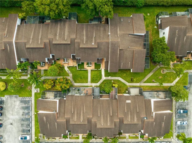 a very nice looking room with a large window and a chandelier